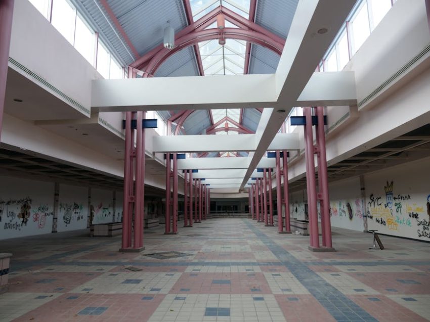 A mural stretches across a former storefront at Riverbend Mall, now home to The Atrium Collective.