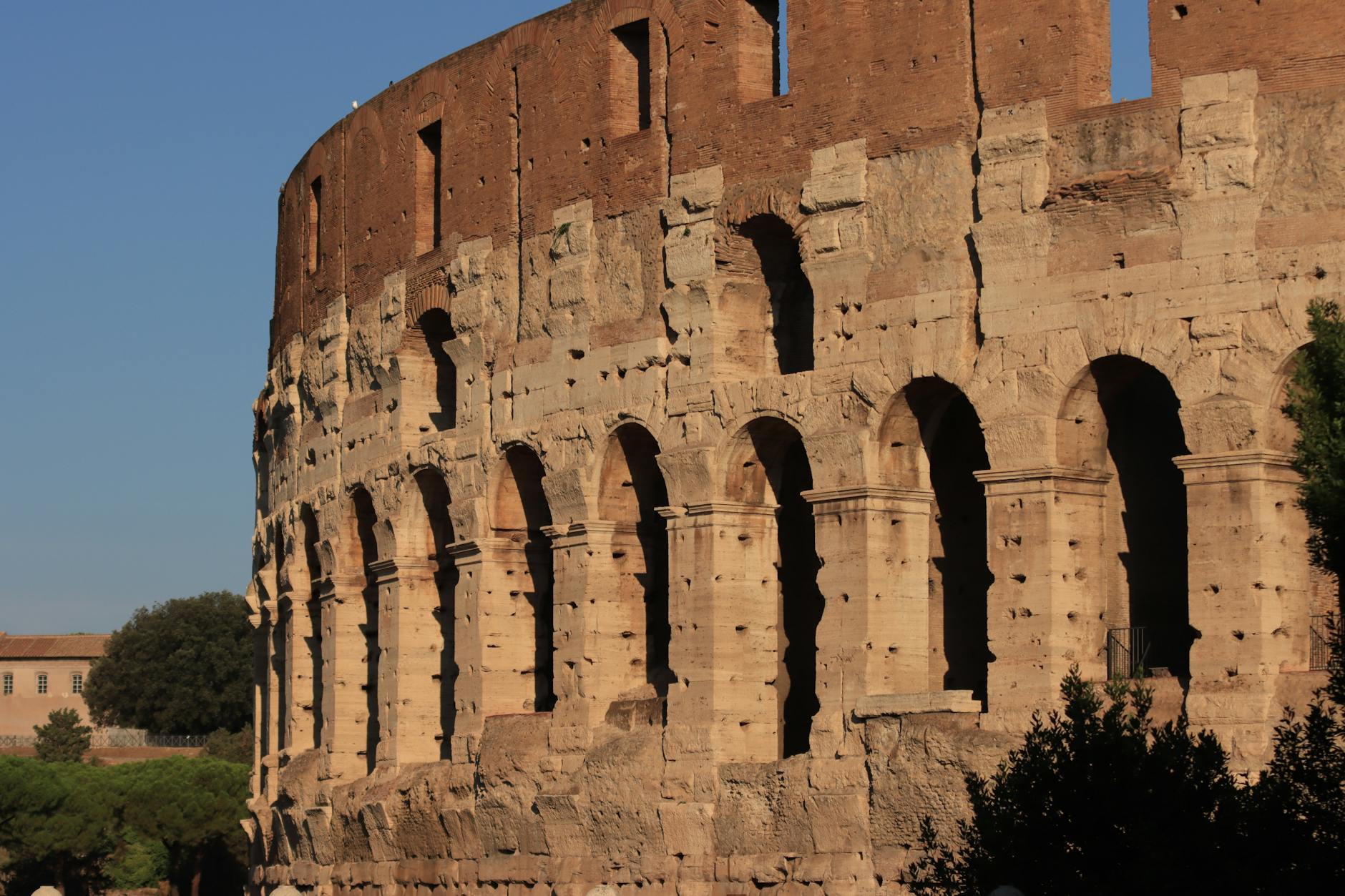 Close-up view of the iconic Colosseum in Rome, highlighting ancient Roman architecture.